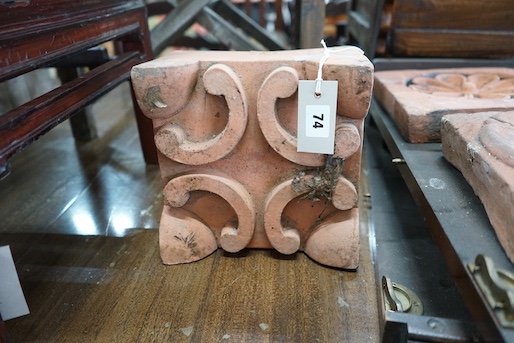 Five square terracotta tiles, largest 22 x 23cm